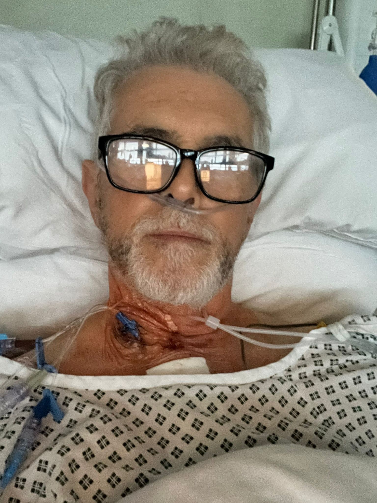 Andy recovering in hospital after open-heart surgery